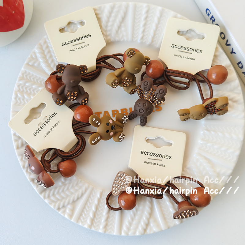 New Korean version autumn and winter children's rubber band, heart bear decorative hair tie, baby hair band, high elasticity and simple hair tie Specification image