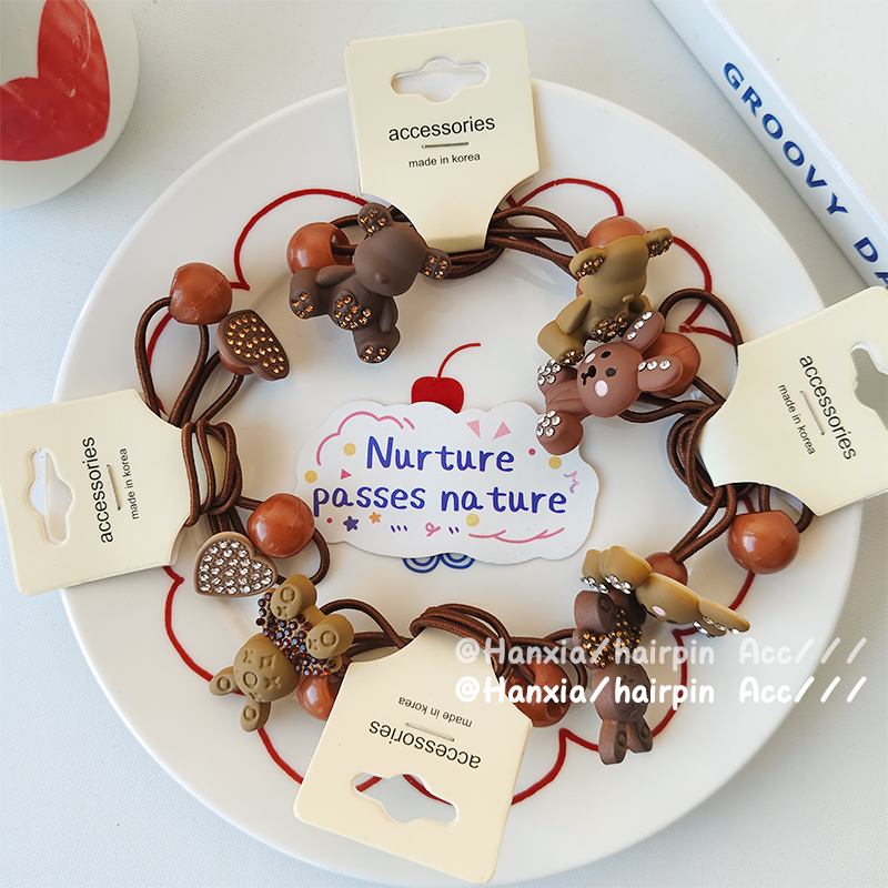 New Korean version autumn and winter children's rubber band, heart bear decorative hair tie, baby hair band, high elasticity and simple hair tie Item Picture