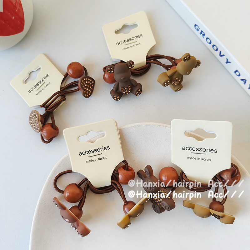 New Korean version autumn and winter children's rubber band, heart bear decorative hair tie, baby hair band, high elasticity and simple hair tie details Picture