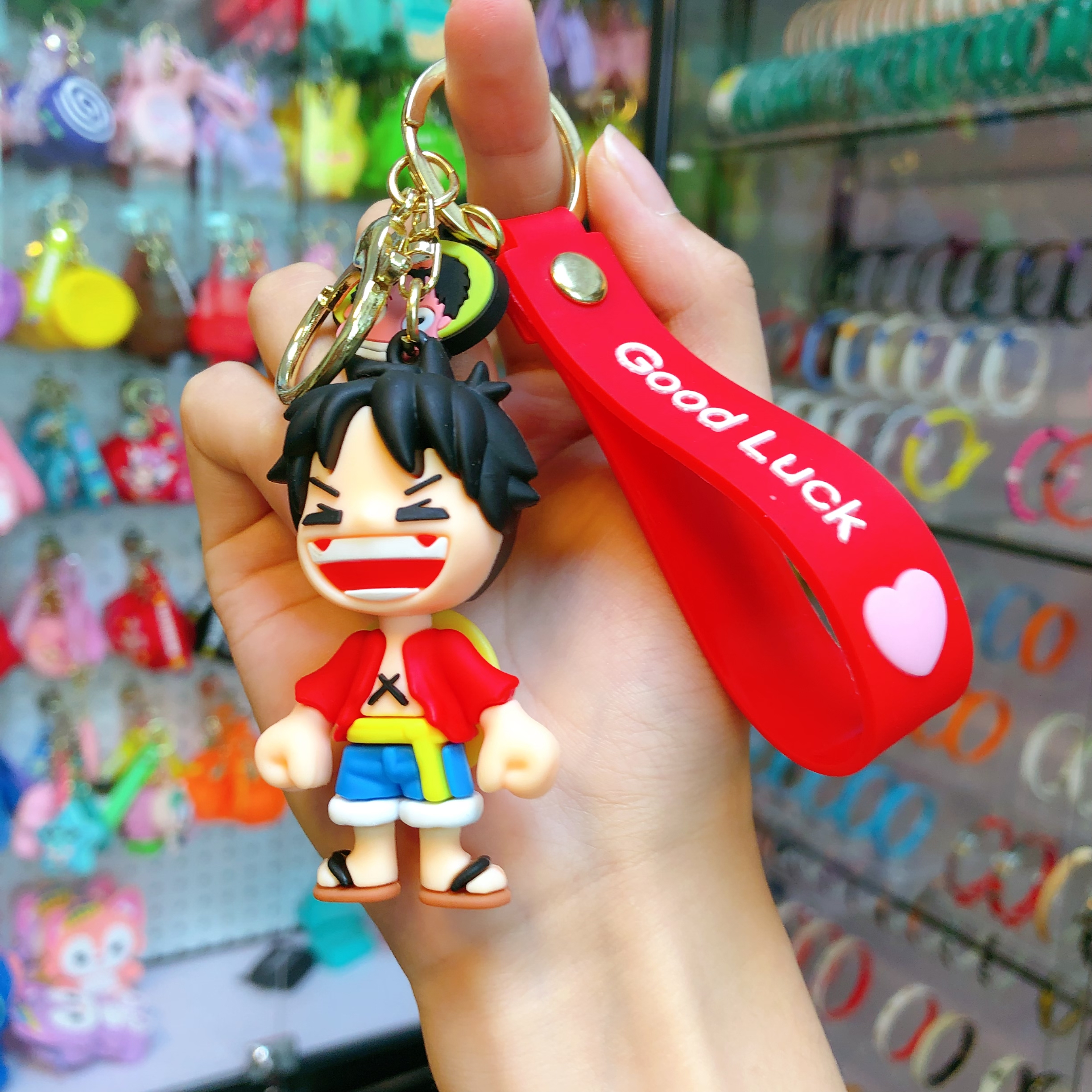 One piece luffy dibujos animados llavero bondadoso pareja bolsas colgantes de llaves para colgantes de coche llavero de silicona one piece luffy dibujos animados llavero de pareja bolsa colgantes de llaves llaves de silicona para colgantes de coche Application Scenario