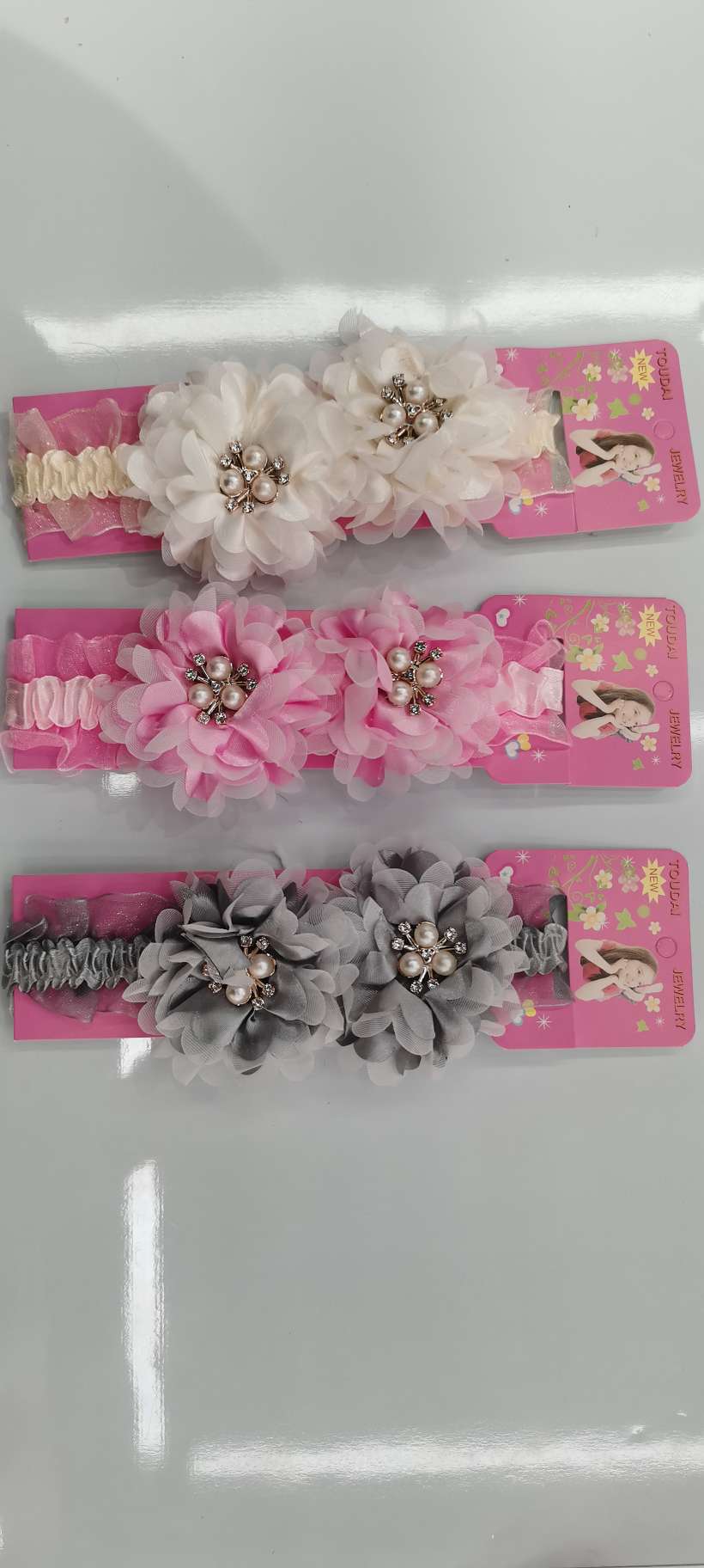 小沙带双花树叶三角珠产品图