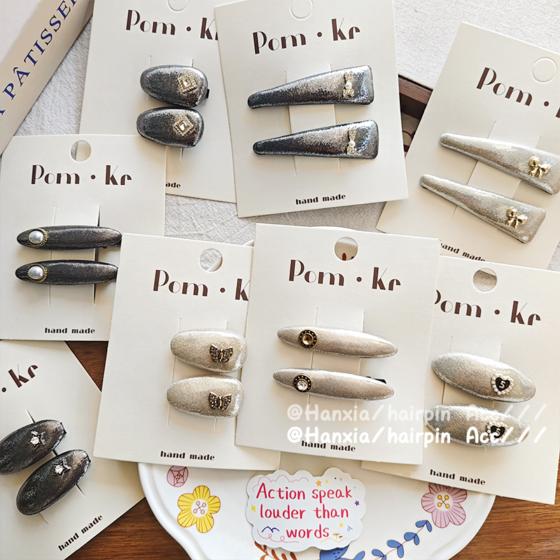 The new cold style star silver leather heart-shaped butterfly diamond hair clip is fashionable, elegant and versatile. It's a duckbill clip