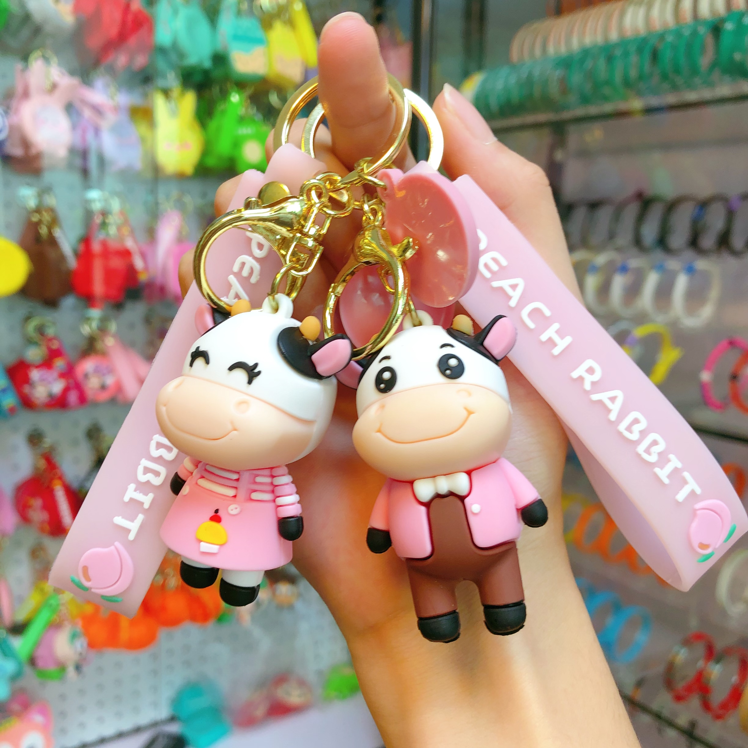 Zodiac cow keychain gifts, couple keychains, student schoolbag pendants, car chain rings, waist hangers, mascots