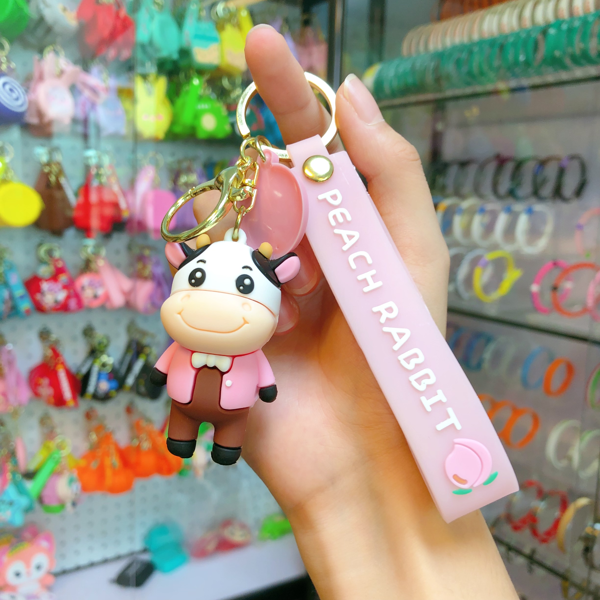 Zodiac cow keychain gifts, couple keychains, student schoolbag pendants, car chain rings, waist hangers, mascots Item Picture