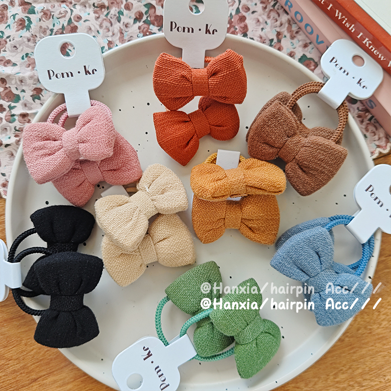 New autumn and winter fabric bow solid color hair band, versatile for children, ponytail elegant hair tie, hair band and hair accessory Application Scenario