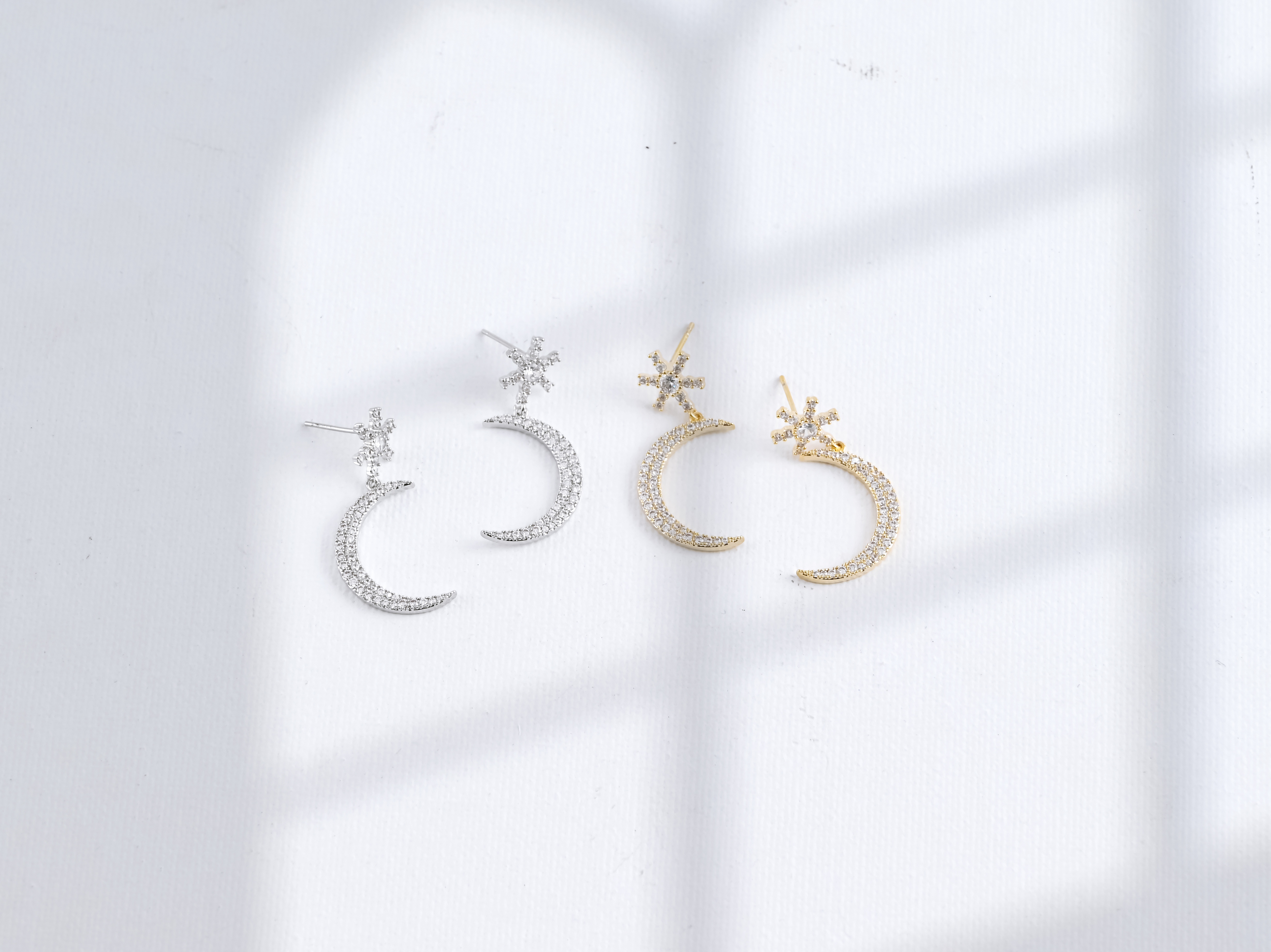 Xuhui brand exquisite and light luxury copper plated with real gold and set with zircon 925 silver needle star moon luxurious design fashionable stud earrings Item Picture