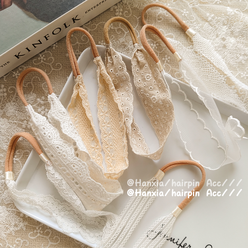 New Korean-style cute and elegant lace-trimmed hand-embroidered headband for children and babies, with a classic white hollowed-out headpiece Item Picture