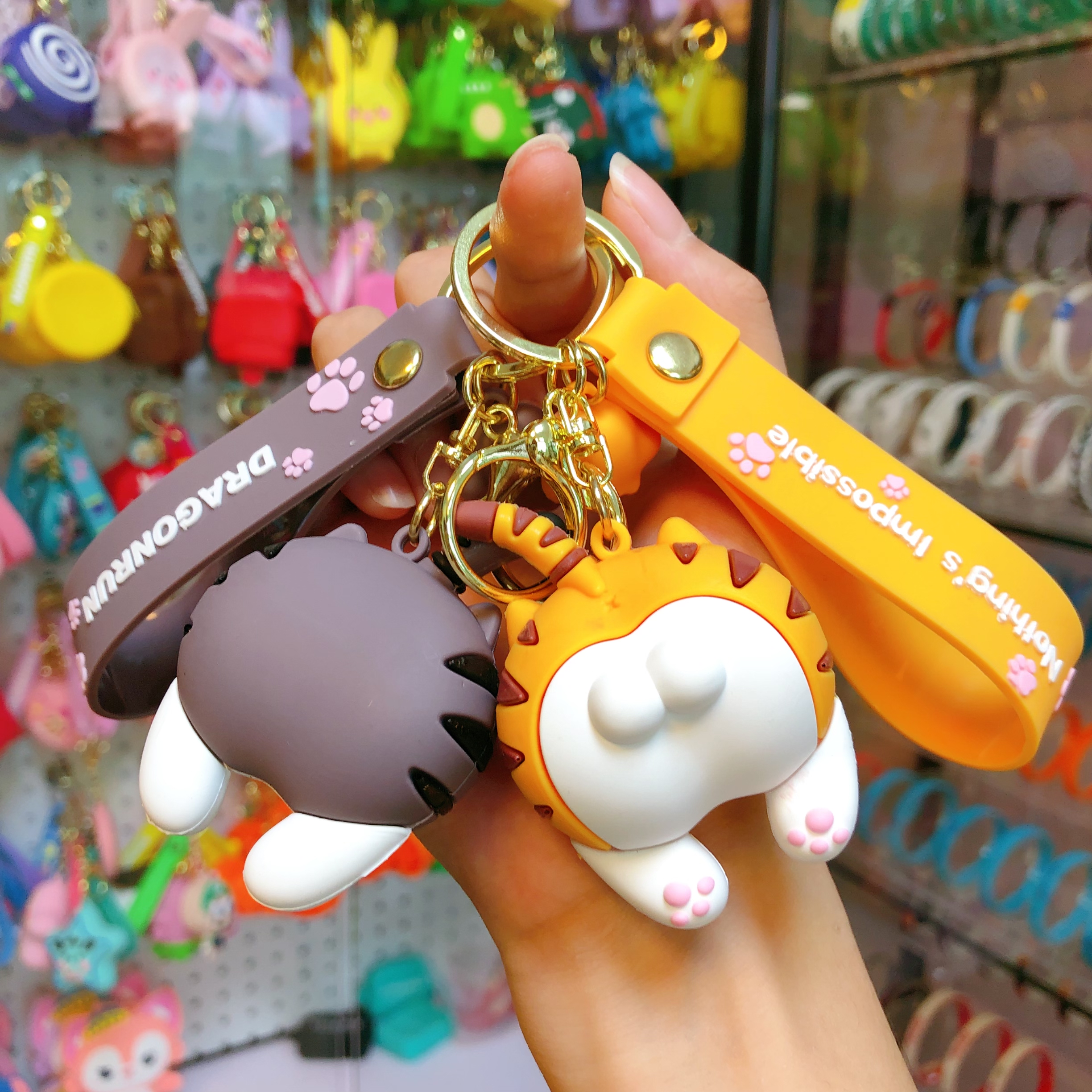 Cartoon cat fart keychain, cute girl's bag, soft plastic figurine pendant, personalized anime car key pendant details Picture