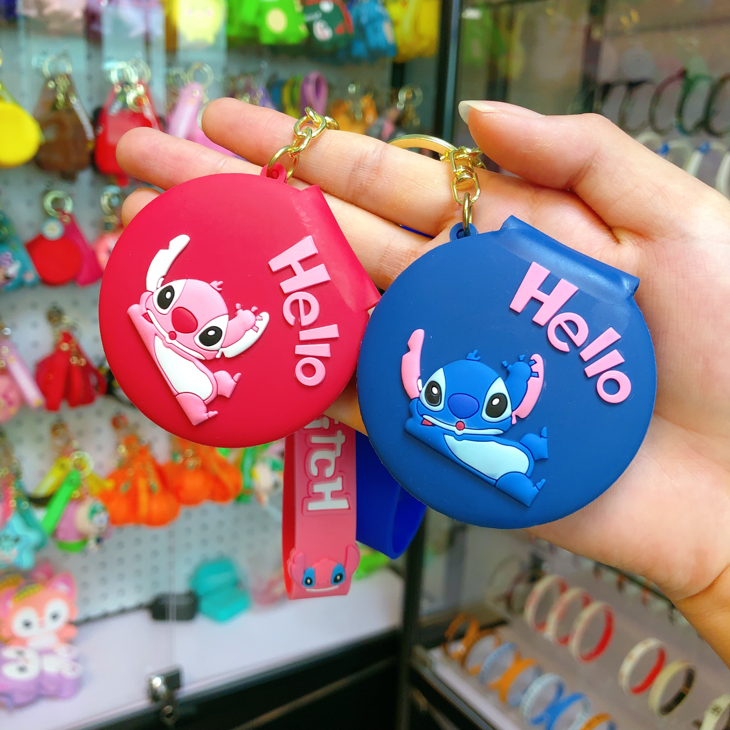 Wholesale of cute cartoon silicone Stitch keychains, convenient makeup mirrors for girls, couple pendants and small gifts details Picture