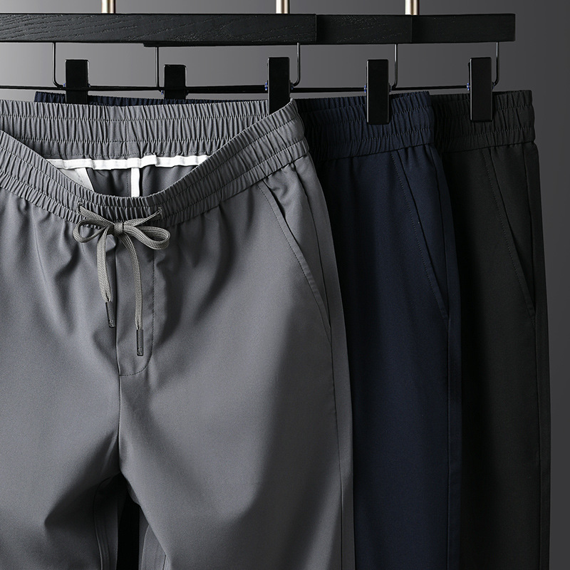 This is a new summer collection of simple and casual pants for men. They are versatile, elastic and thin ice silk sports men's pants details Picture