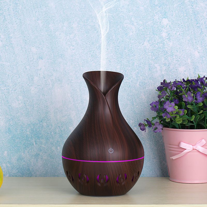 Vase, hollowed-out wood grain humidifier, aroma diffuser, desktop, car, seven-color light, can add essential oil Application Scenario