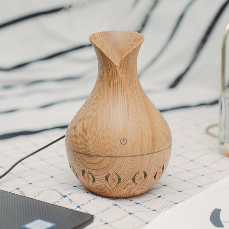 Vase, hollowed-out wood grain humidifier, aroma diffuser, desktop, car, seven-color light, can add essential oil Item Picture
