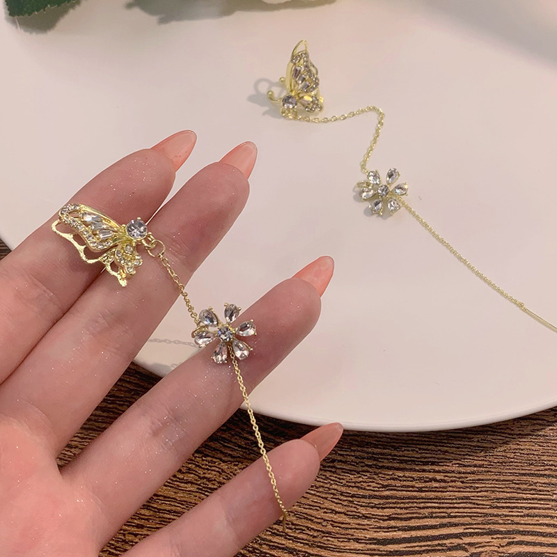 Douyin's same style butterfly flower one-piece earrings, ear bone clip, Korean style, cold and cool, dynamic butterfly ear line Application Scenario