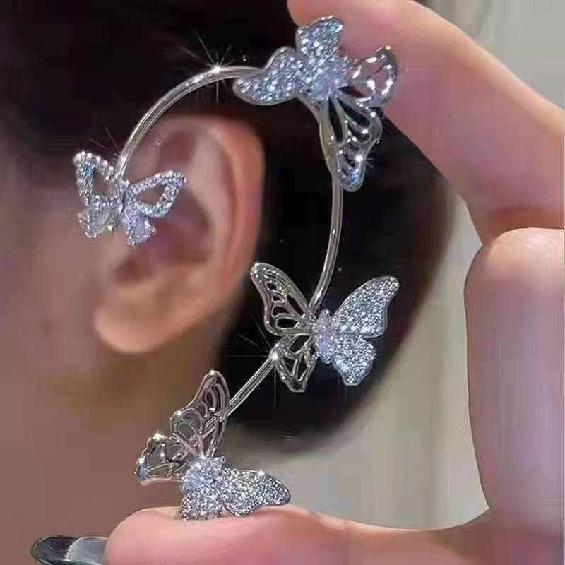 Cross-border hot-selling hollowed-out butterfly ear hooks and ear clips, fairy-like high-end one-piece feminine charm, no-ear piercing earrings wholesale