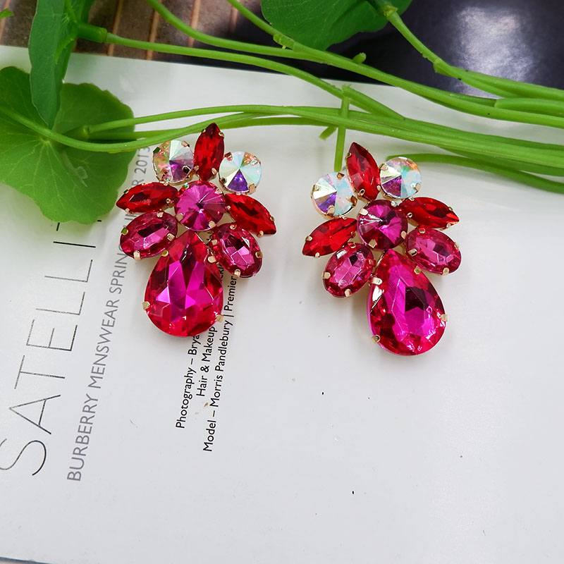 A Pair Of Women Wearing Exaggerated Geometric Glass Earrings Travel Photo European And American Fashion Earrings Item Picture