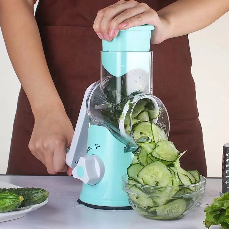 The new household hand-rolling roller vegetable cutter multi-functional three-in-one kitchen vegetable slicing potato shreds Application Scenario
