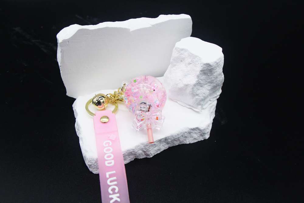 钥匙扣女2024可爱棒棒糖液体闪光时尚透明钥匙扣产品图