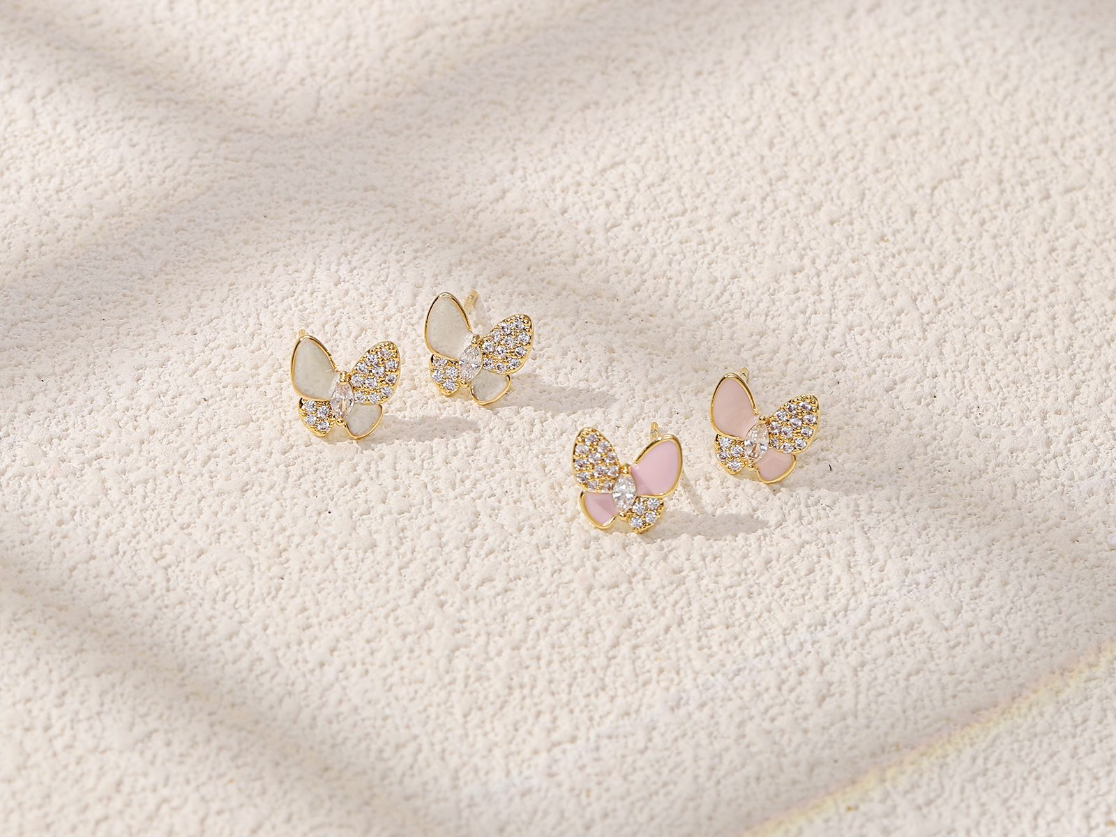Xuhui brand exquisite and light luxury copper plated with real gold and set with zircon 925 silver needle butterfly design fashionable stud earrings full figure