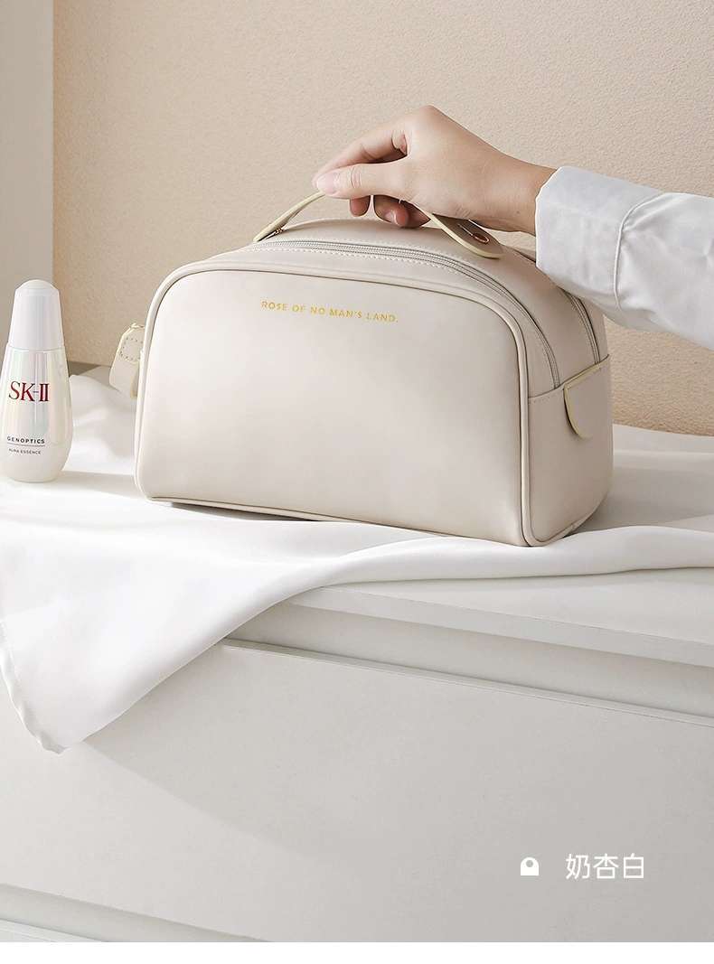 The new PU double-zipper cosmetic bag features a large capacity, portability, and a high level of appearance. It is a hand-held toiletry bag and a cosmetic storage bag details Picture