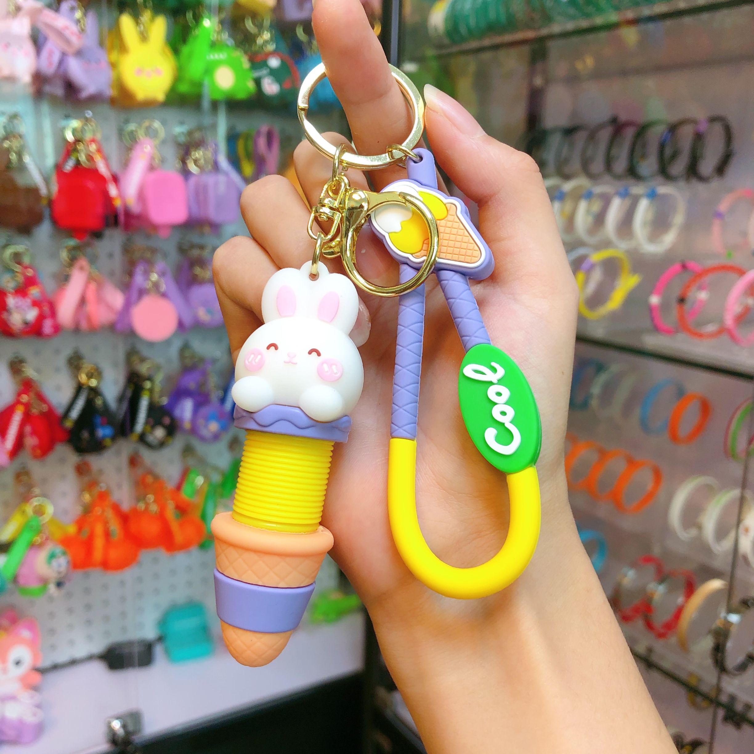 Wholesale of cartoon creative stretchable neck keychains, fun stress-relieving bag pendants, car ornaments, chain rings, and small gifts Item Picture