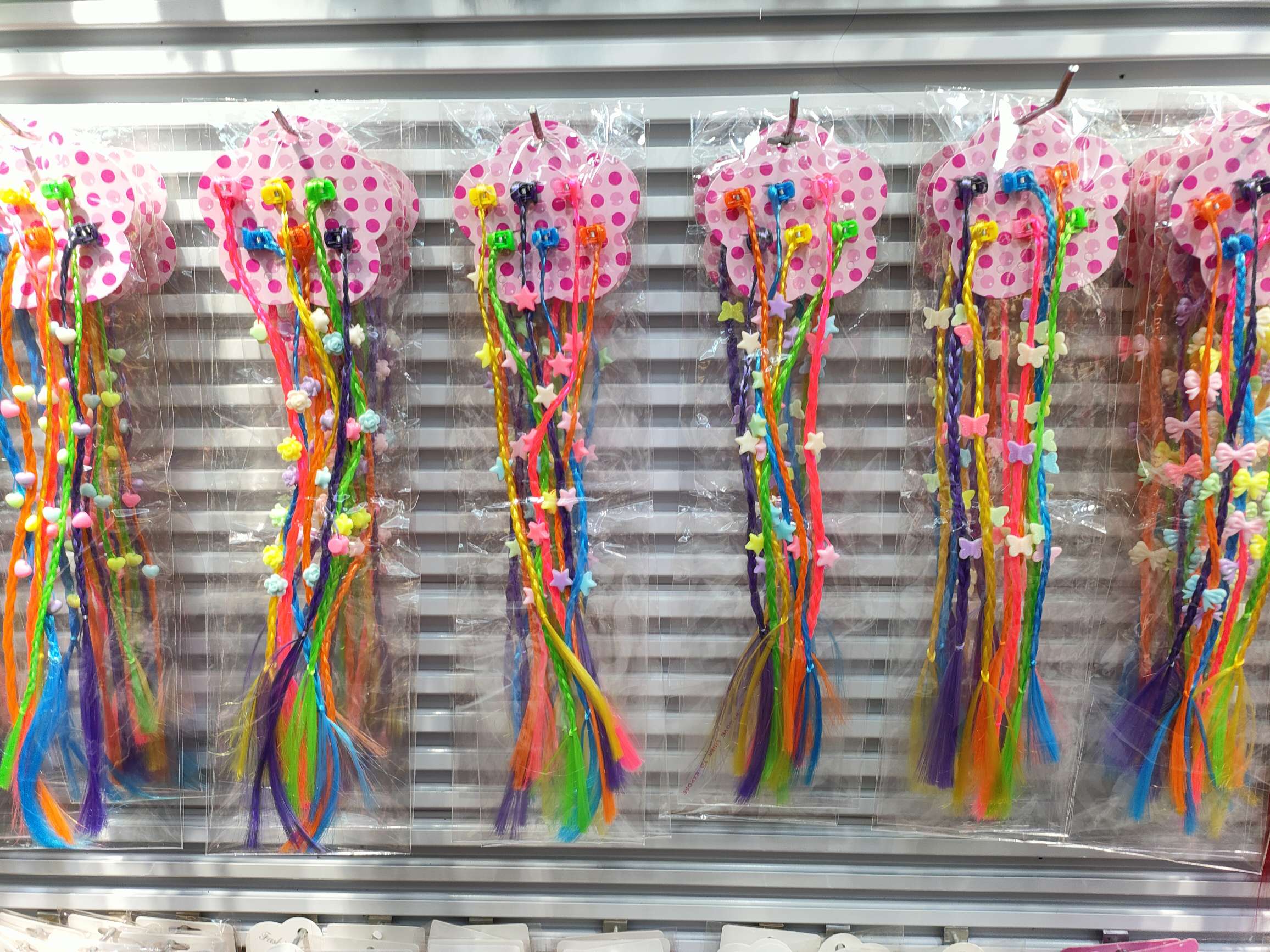 Handcrafted beaded false braids