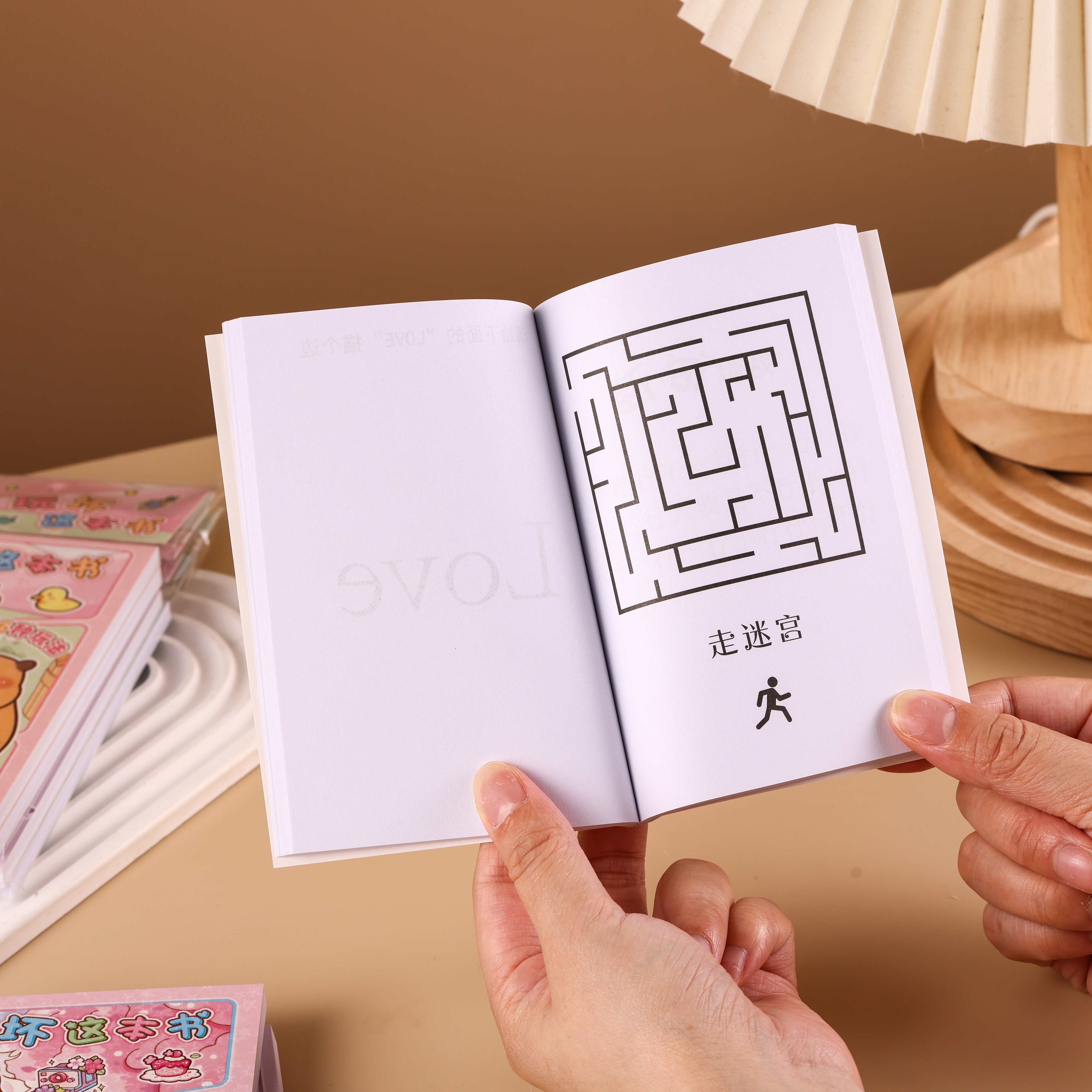 This book is a stress-relieving game notebook with rich imagination. It comes in a box and can be hung up Specification image