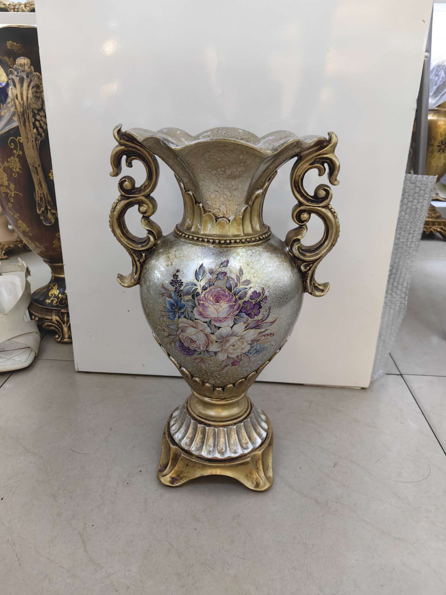 Champagne-colored resin vase