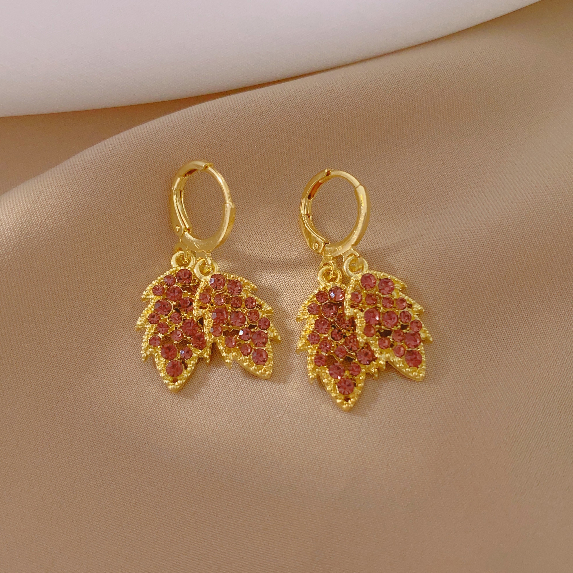 The new fashionable leaf earrings are a must-have for women, exuding a light luxury and high-end vibe. They are unique, individualistic and elegant earrings