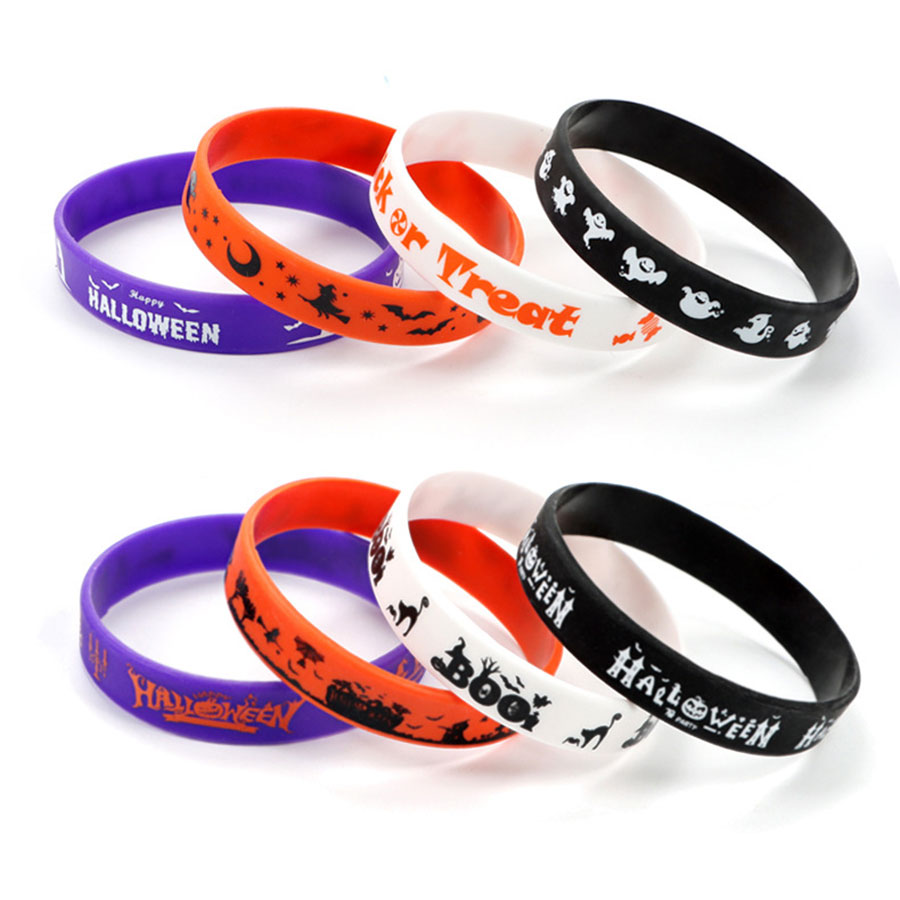 Halloween party Halloween Silicone wristband with pumpkin on the wrist. Trick or Treat! Wristband Halloween party Halloween Silicone Wristband hand Application Scenario