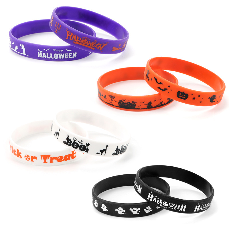 Halloween party Halloween Silicone wristband with pumpkin on the wrist. Trick or Treat! Wristband Halloween party Halloween Silicone Wristband hand details Picture