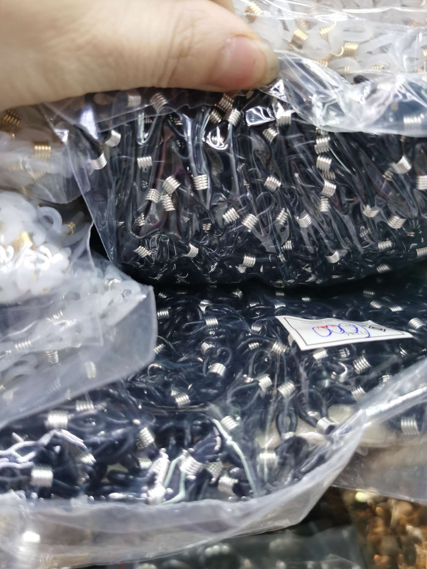 The black and white eyeglass case is a king details Picture