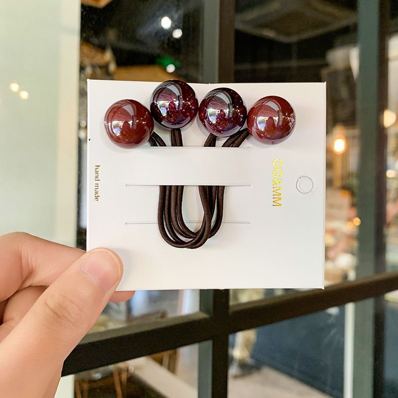 A cute student in a Korean Internet celebrity's hair circle has a hair tie with popping beads, color-blocking balls, a ball hair tie, a ponytail and a hair tie detail image 3