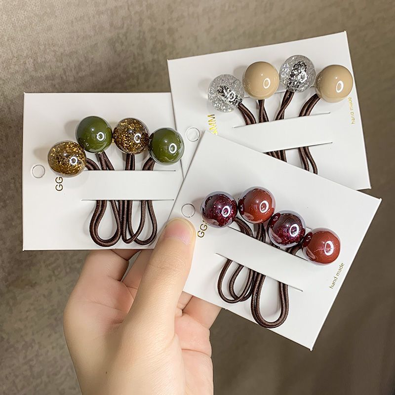 A cute student in a Korean Internet celebrity's hair circle has a hair tie with popping beads, color-blocking balls, a ball hair tie, a ponytail and a hair tie detail image 2