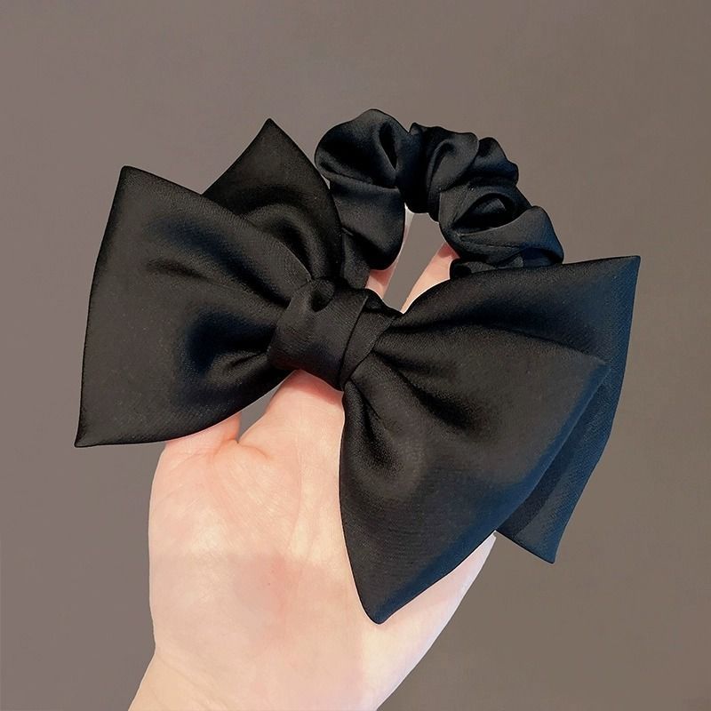 A large bow tie for a fleeing princess in distress, a large intestine hair tie for a woman, a high-end look, a low bun hair accessory, a headwear for a girl Item Picture