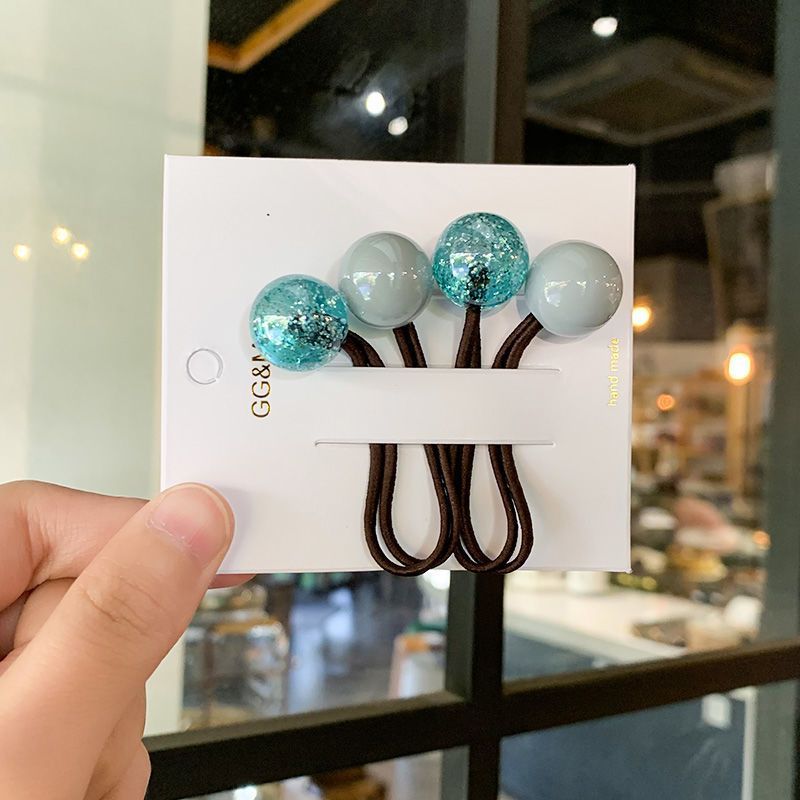 A cute student in a Korean Internet celebrity's hair circle has a hair tie with popping beads, color-blocking balls, a ball hair tie, a ponytail and a hair tie Specification image