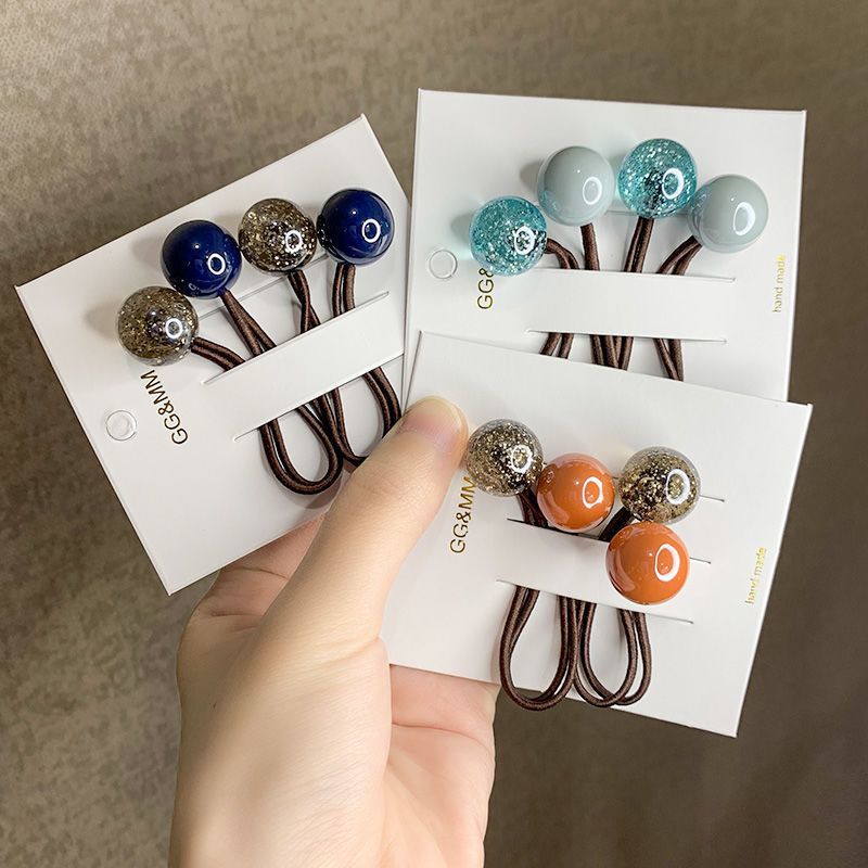 A cute student in a Korean Internet celebrity's hair circle has a hair tie with popping beads, color-blocking balls, a ball hair tie, a ponytail and a hair tie detail image 6