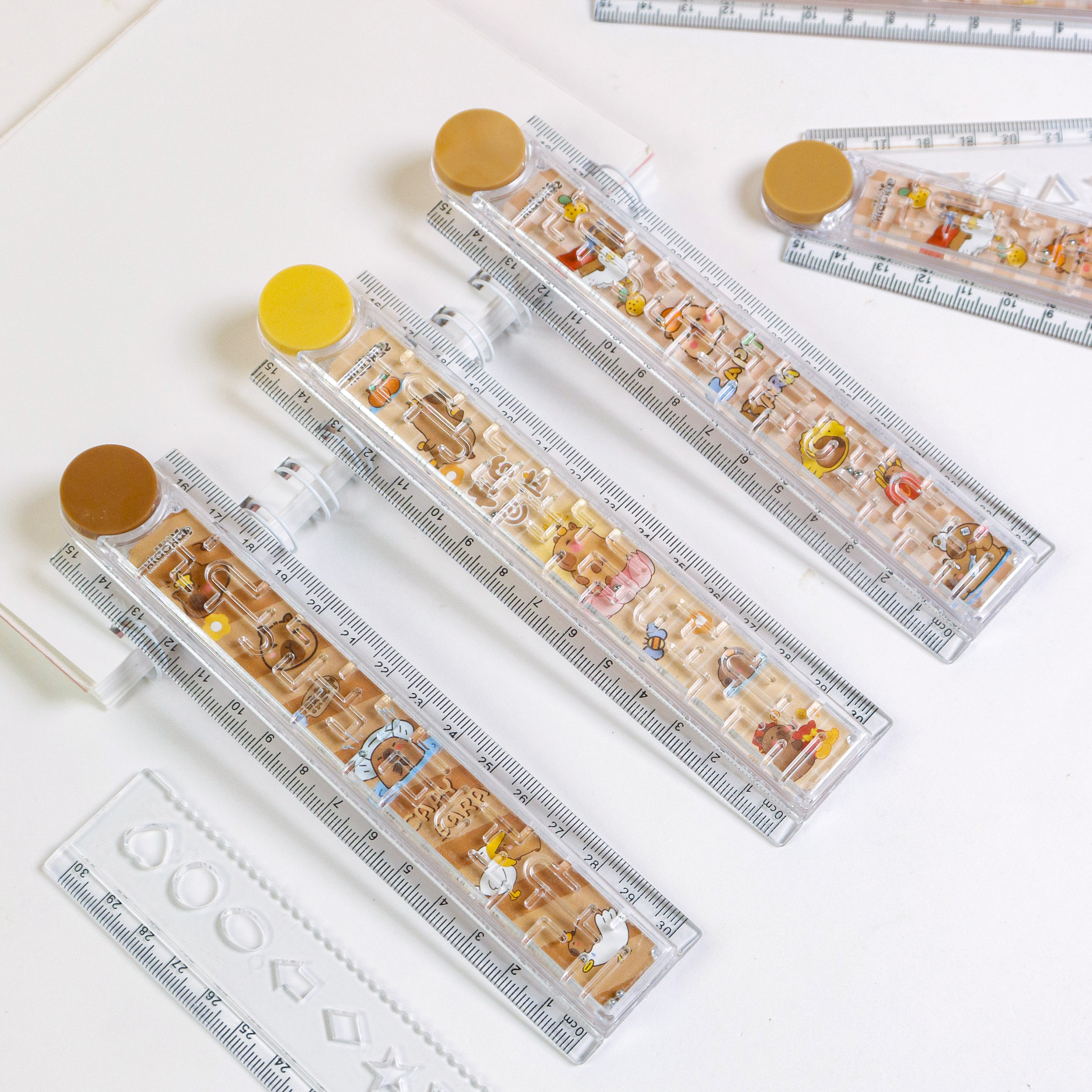 The cardboard maze folding ruler is a creative and cute student supply set. It is an essential tool for learning. The folding design features cartoon patterns, high transparency, clear printing, and is not easy to wear. The material is tough details Picture