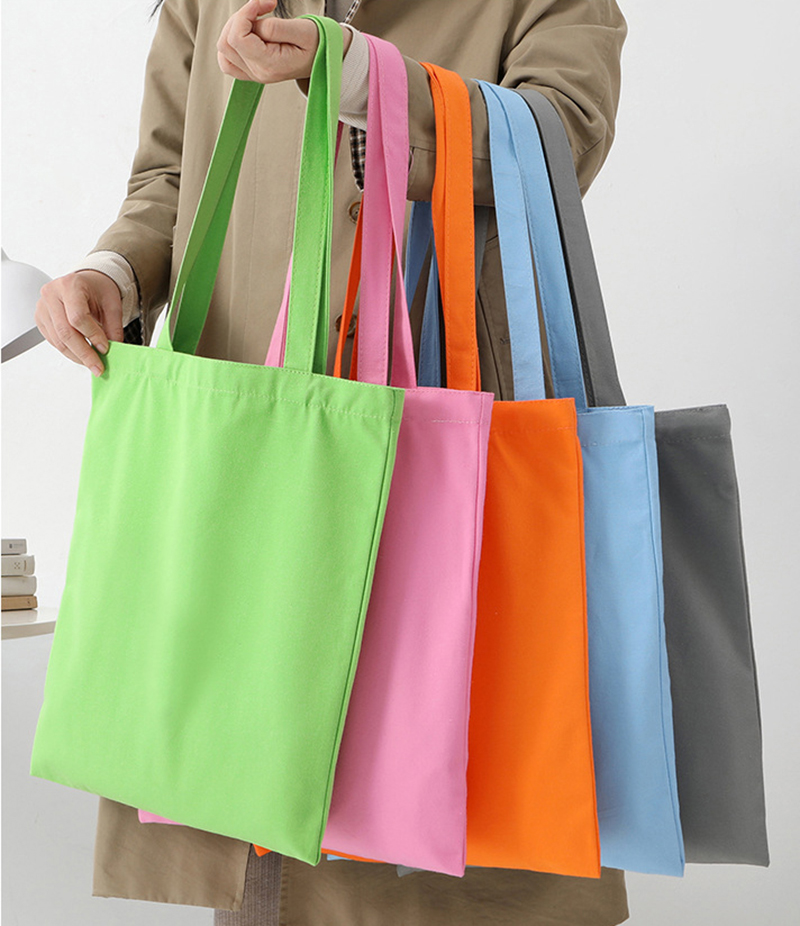 Factory wholesale blank canvas bags, shopping hand-held canvas bags, simple and versatile, advertising customization with logo printing details Picture