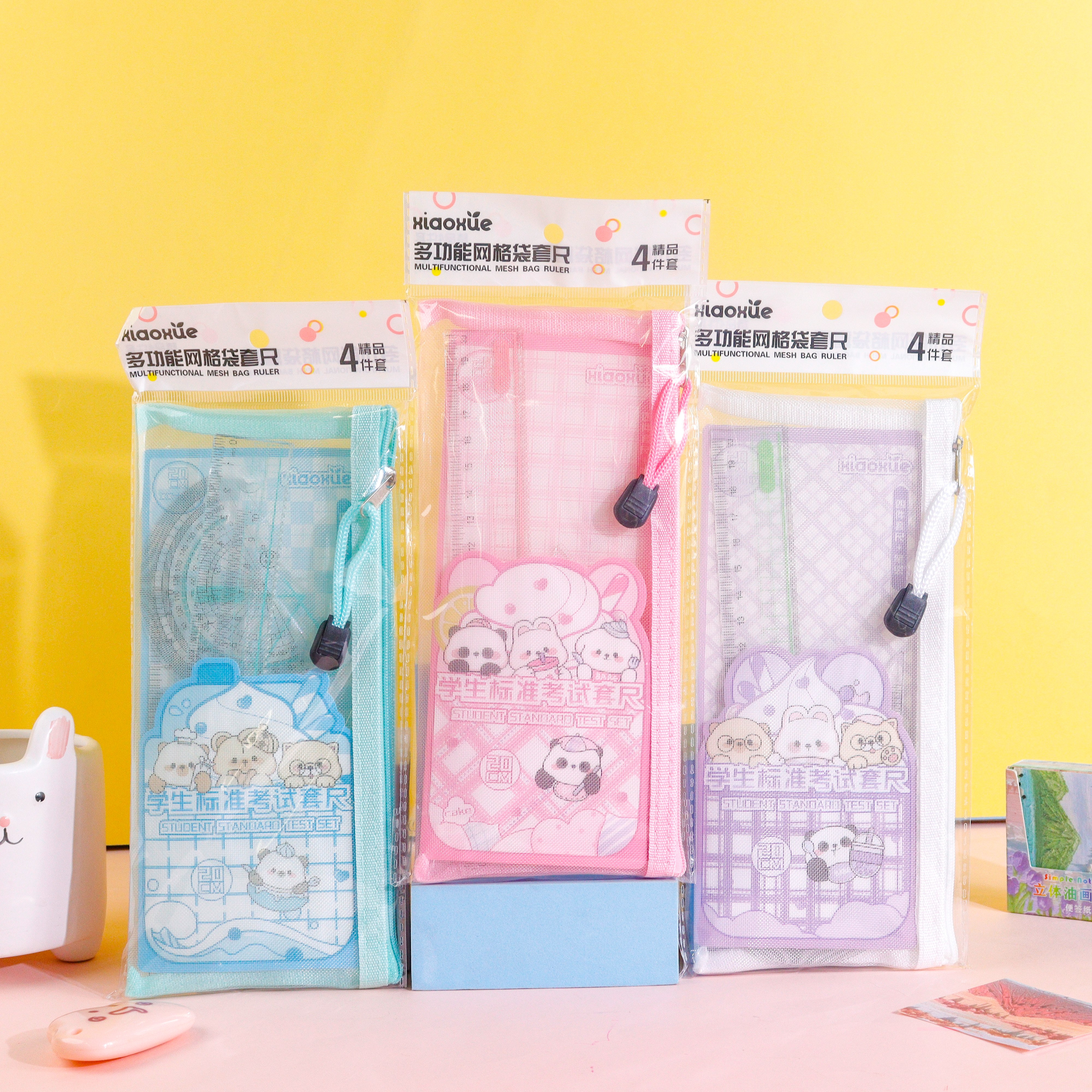 XX-0016 Multi-functional grid bag 4-piece set, essential tool for learning, high school, primary school and junior high school students cartoon pattern high transparency ruler set Application Scenario