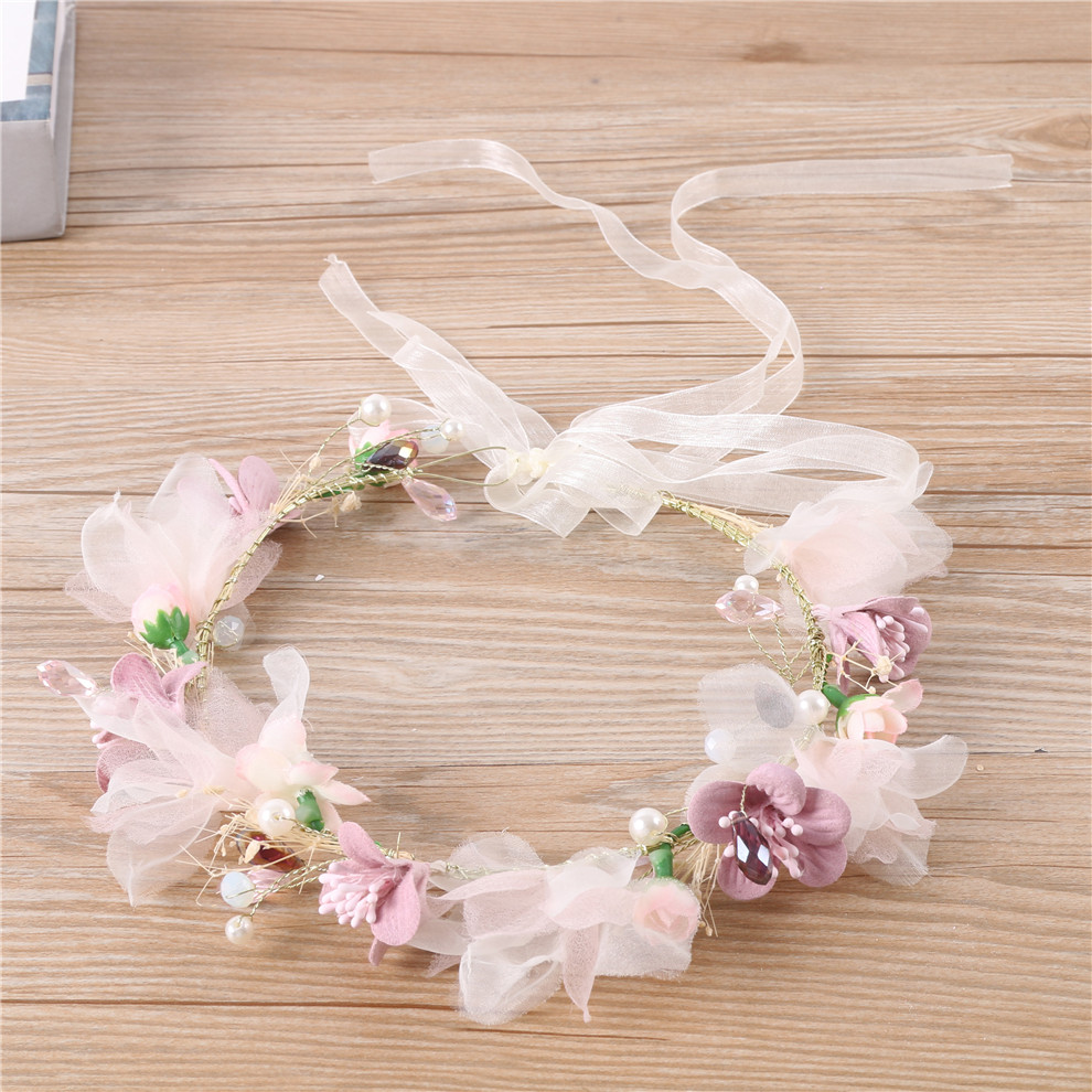 The new Jialan brand from the factory features a fresh little Daisy wreath, a simple Korean princess sweet hairband, a forest girl style travel photo prop, and a crystal wreath