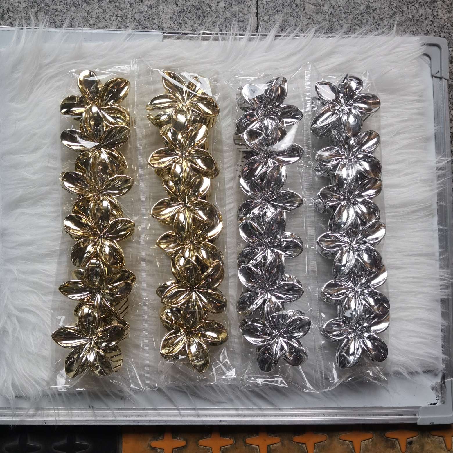 Electroplated gold and silver frangipani detail image 2