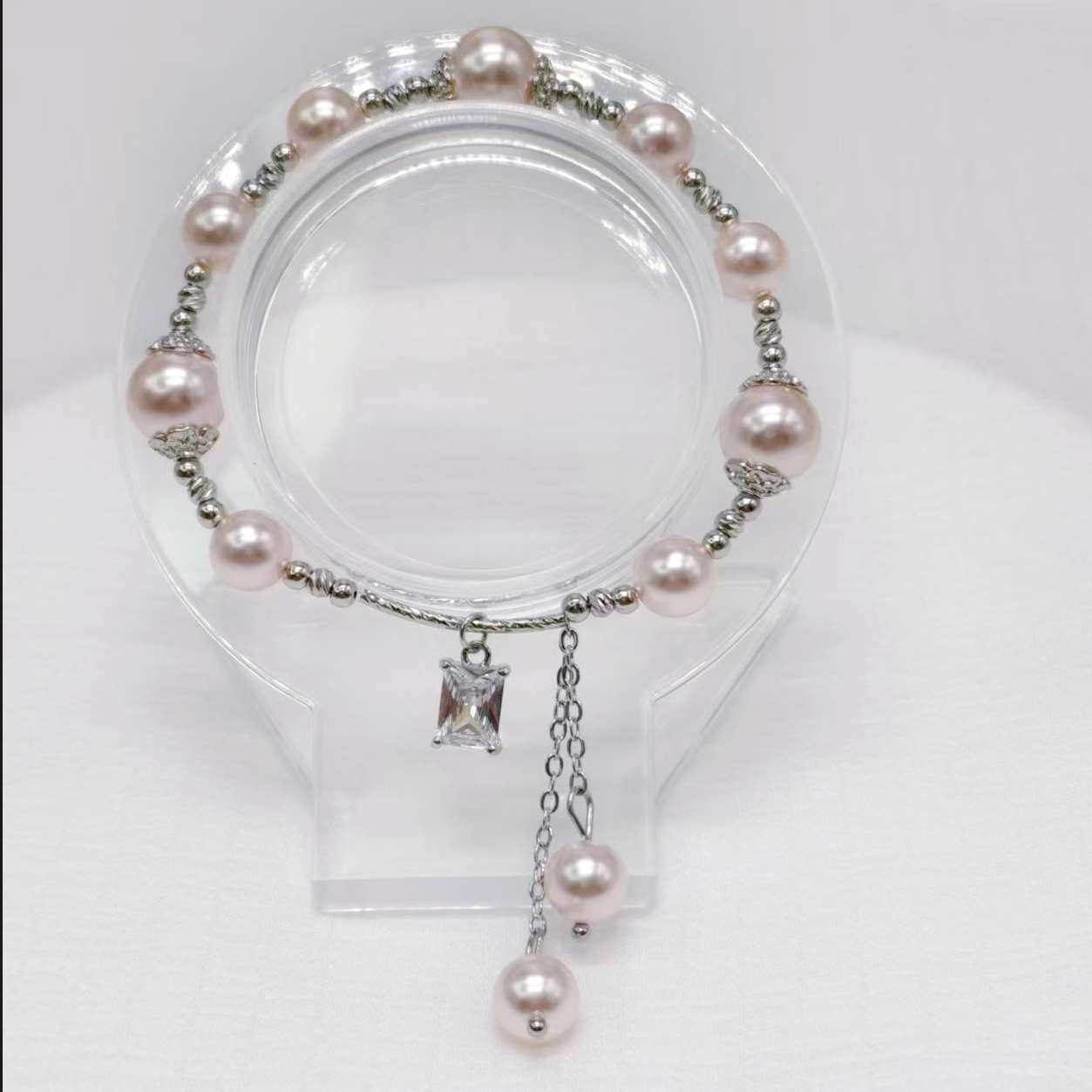 The Shijia pearl copper Bead Square Zircon bracelet features a high-end, mass-market, and light luxury design. It is a popular online hit with copper tube tassel ornaments detail image 2