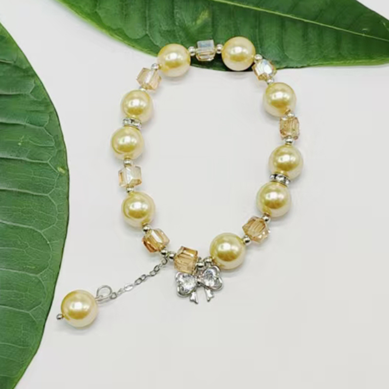 施家珍珠锆石领结手链金色系手链大众轻奢设计高级感高颜值高品质饰品手串网络爆款2024新款详情图5