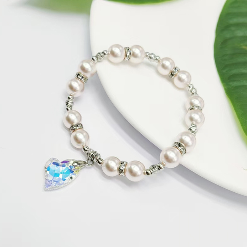 Shi Family Pearl Crystal heart-shaped bracelet, pink series bracelet, popular light luxury design, high-end feel, high appearance level, high-quality accessory bracelet, Internet bestseller, 2024 new style Application Scenario