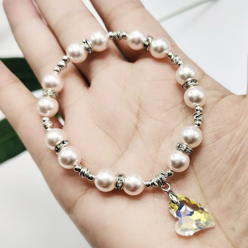 Shi Family Pearl Crystal heart-shaped bracelet, pink series bracelet, popular light luxury design, high-end feel, high appearance level, high-quality accessory bracelet, Internet bestseller, 2024 new style Specification image