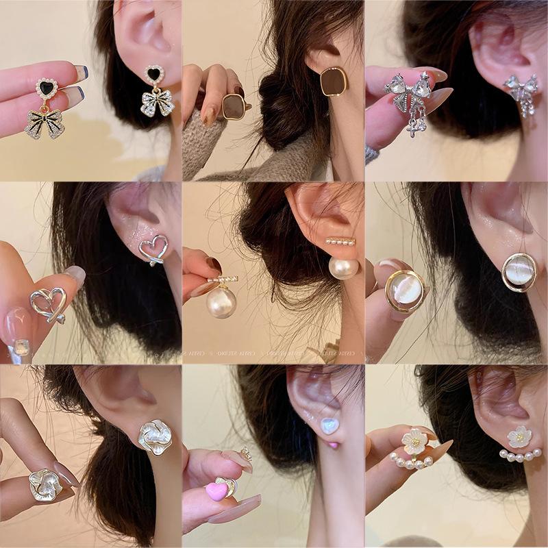 925 silver needle pearl earrings women's high sense niche temperament bow stud earrings retro affordable luxury ear rings wholesale
