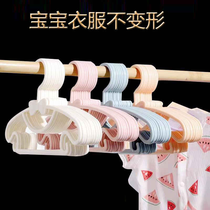 wholesale child baby clothes hanger baby newborn clothes hanger seamless cute bow clothes hanger wet and dry dual-use