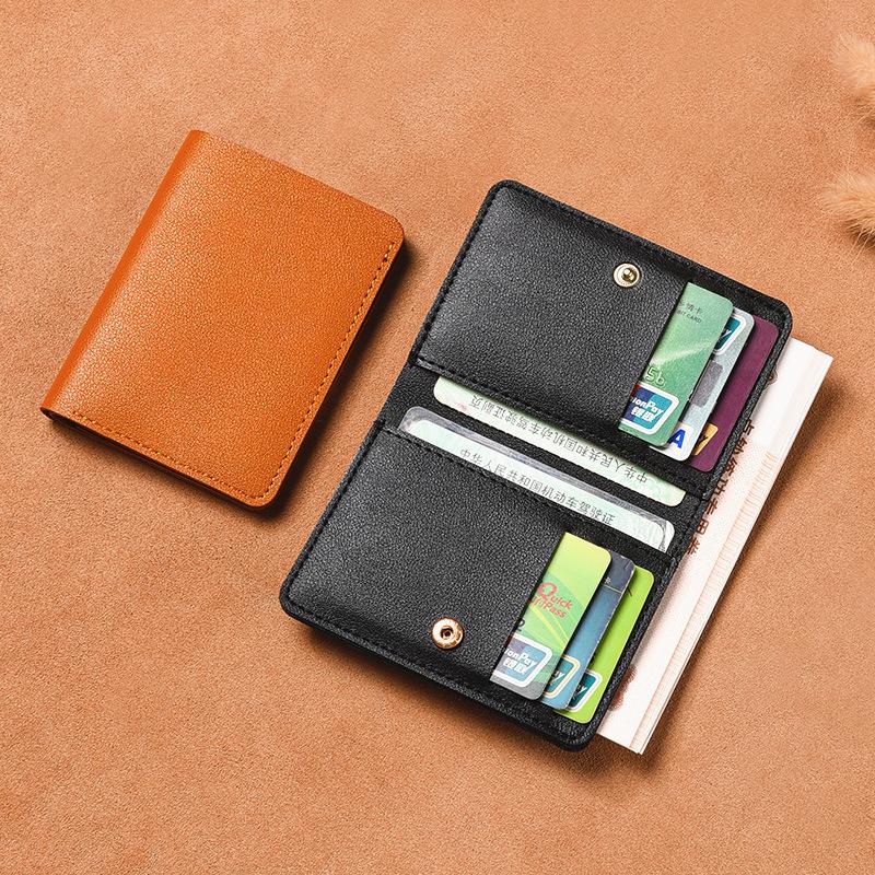2024 new ladies' purse simple folding snap button small wallet driving license card holder male student soft leather wallet wholesale