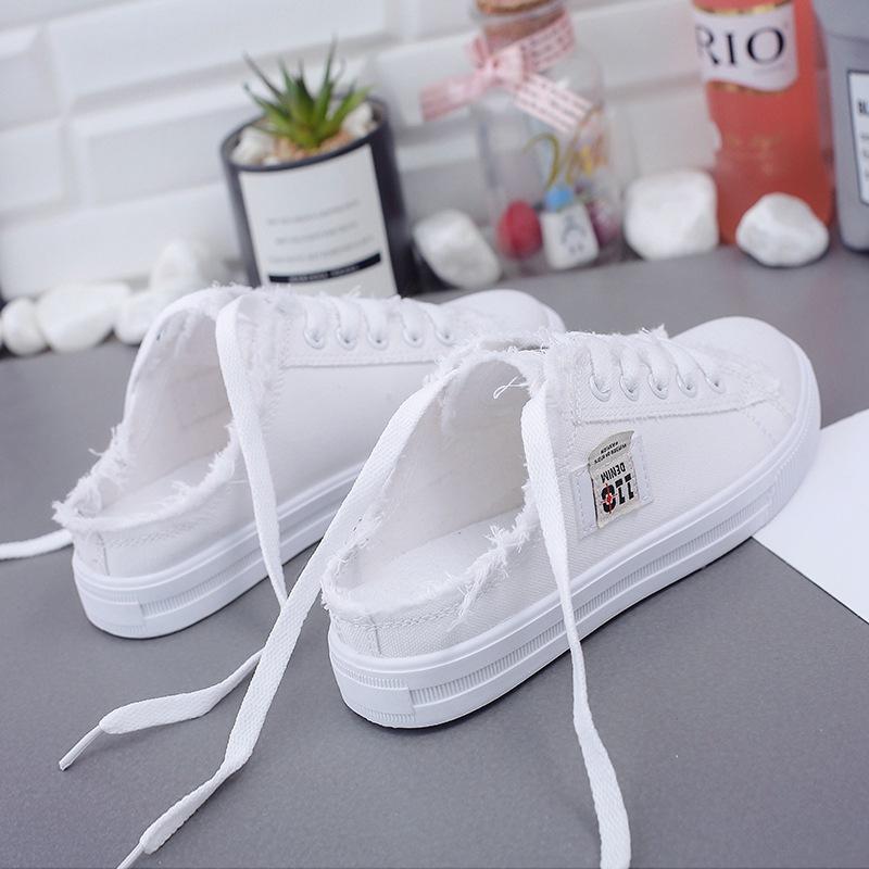 canvas shoes new women's clothes spring 2024 small white shoes flat skate shoes lazy shoes slip-on half support wholesale