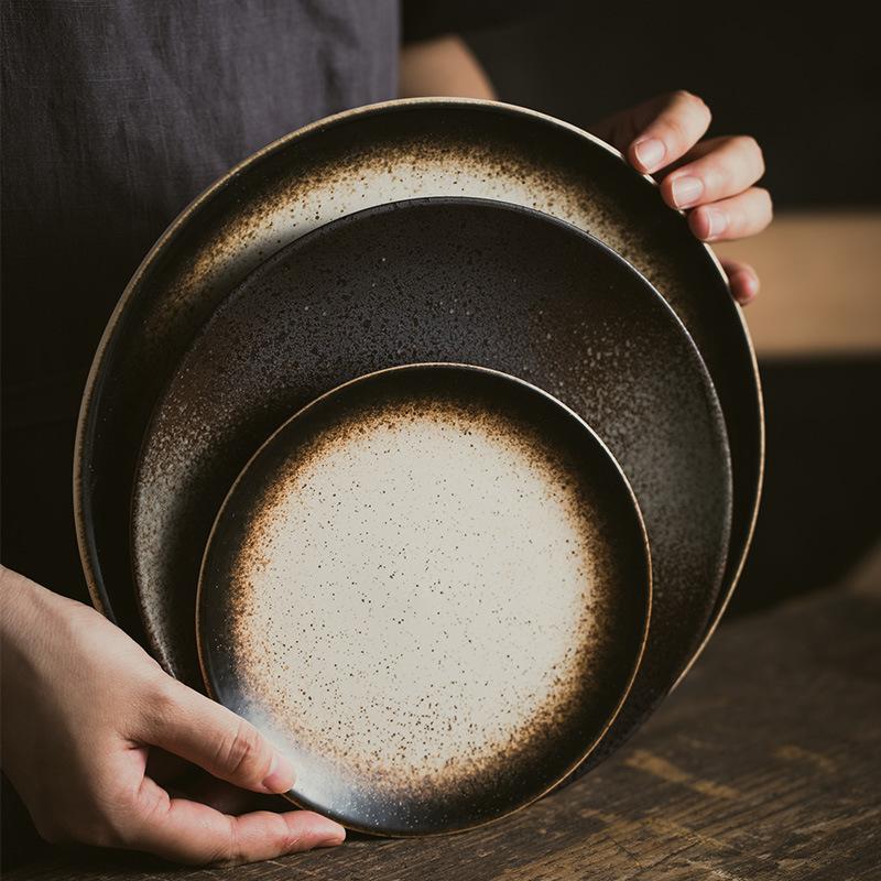 japanese retro ceramic shallow plate creative black restaurant personality glaze dish bone dish household tableware flat plate Application Scenario